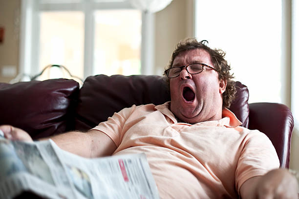 Sleepy fatso  People Yawning stock pictures, royalty-free photos & images